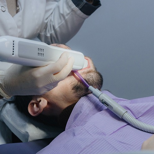A man having digital dental impressions made